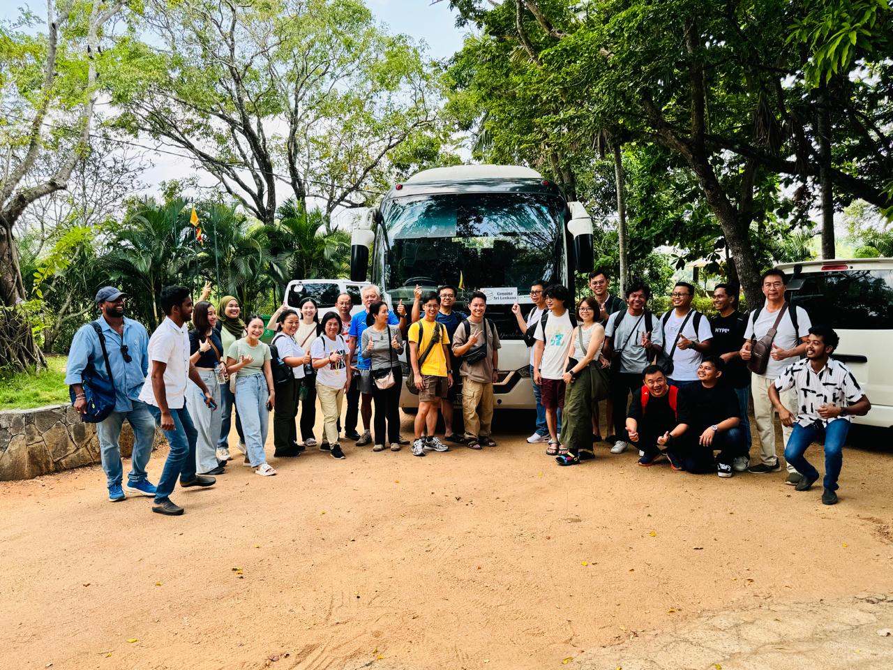 A group of cruise passengers with their private Colombo Day Tours minibus and driver-guides on a Sri Lanka day excursion